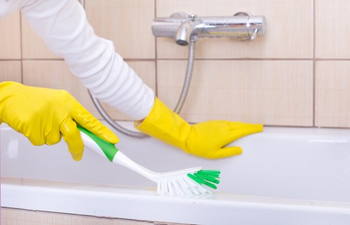 Detailed builders clean tackling dust and residue in a Fulham home