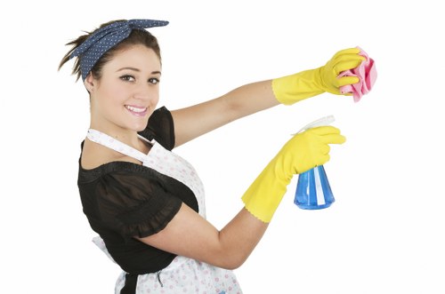 Staff handling cleaning products with safe procedures